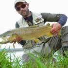 Hooked him, broke in him. Lost sight of him as he swam off.. I cast again in the murky water after retying an identical fly on. Suddenly, a solid take from the murk. I got my fly back!