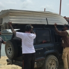 Unloading the Condom Boat