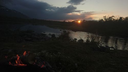 sunset and campfire